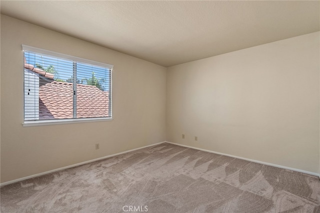 15280 Dunes Way, Moreno Valley, CA 92555 - unfurnished room featuring carpet flooring and baseboards