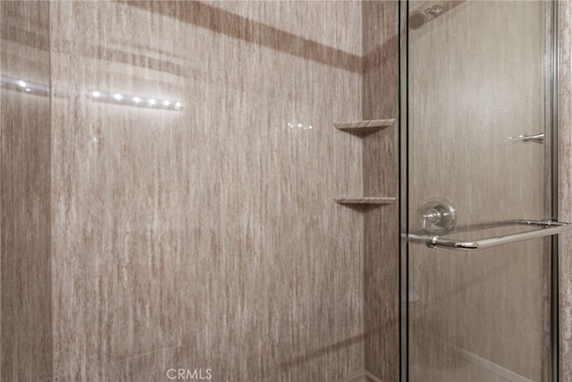 15280 Dunes Way, Moreno Valley, CA 92555 - bathroom featuring a shower with shower door