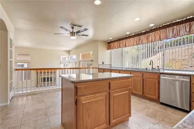 15280 Dunes Way, Moreno Valley, CA 92555 - kitchen featuring dishwasher, a kitchen island, ceiling fan, healthy amount of natural light, and recessed lighting