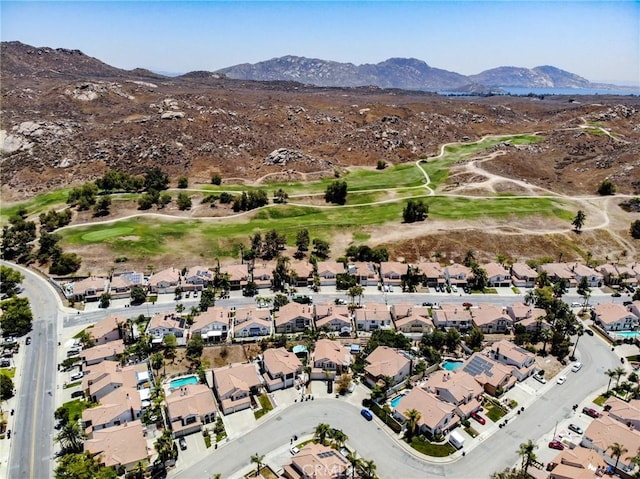 15280 Dunes Way, Moreno Valley, CA 92555 - aerial view of property and surrounding area with mountains, a local golf course, and nearby suburban area
