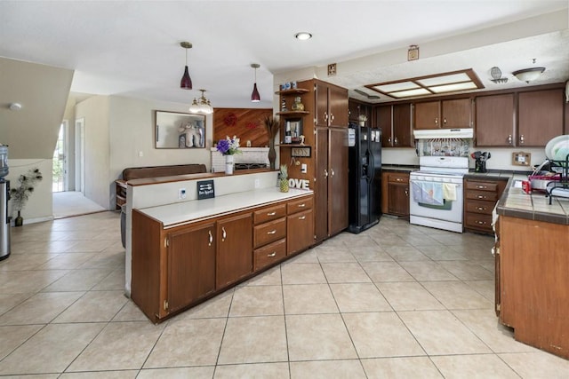 3329 Mandy Ln, Spring Valley, CA 91977 - kitchen featuring white range with electric cooktop, black fridge, under cabinet range hood, a peninsula, and open shelves