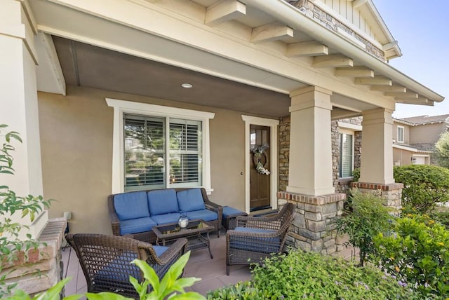 11550 Carowind Ln, Scripps Miramar, CA 92131 - property entrance featuring an outdoor hangout area, stone siding, stucco siding, and a porch