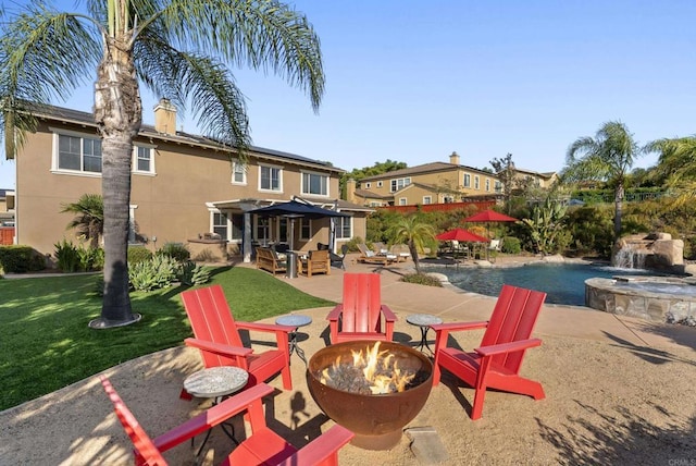 11550 Carowind Ln, Scripps Miramar, CA 92131 - view of patio with an outdoor fire pit, an in-ground hot tub, and an outdoor pool