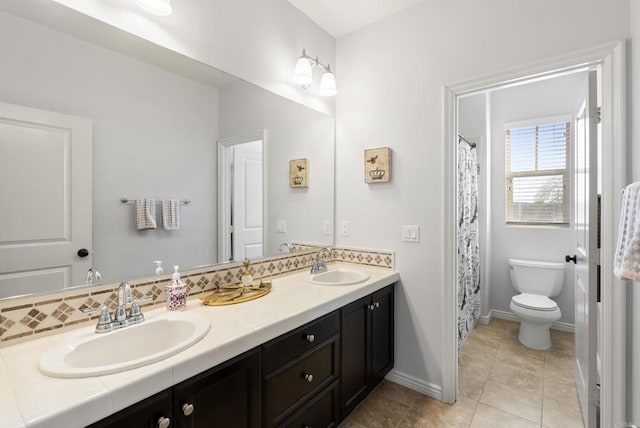 11550 Carowind Ln, Scripps Miramar, CA 92131 - full bathroom featuring double vanity and tile patterned flooring