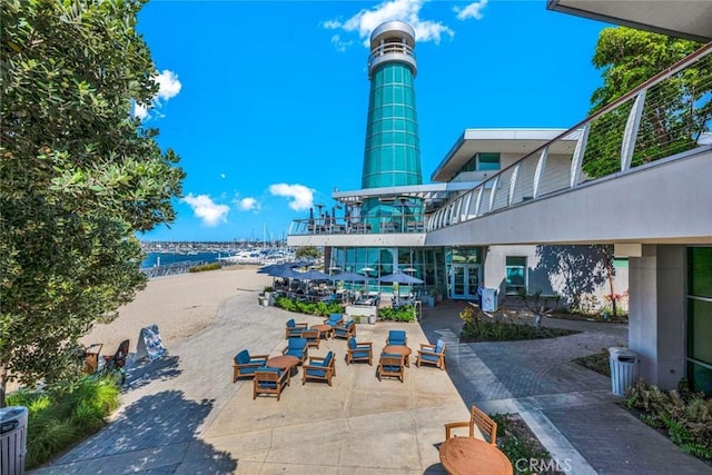 300 34th St, Newport Beach, CA 92663 - view of home's community with a patio and a water view