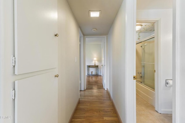 552 Cayo Grande Ct, Newbury Park, CA 91320 - hallway featuring baseboards and light wood-style floors