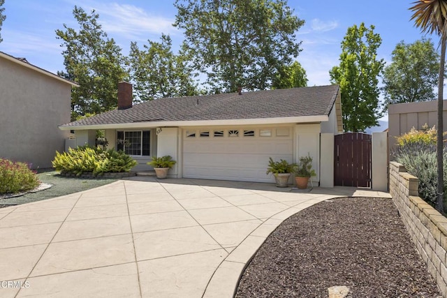 552 Cayo Grande Ct, Newbury Park, CA 91320 - view of front of house with concrete driveway, a gate, an attached garage, and stucco siding