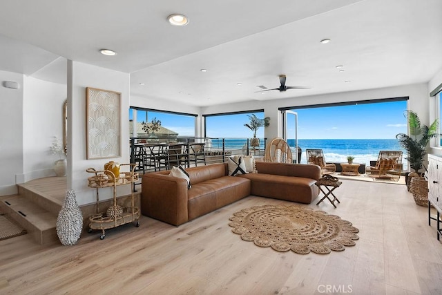 516 S The Strand # A, Oceanside, CA 92054 - living room featuring wood finished floors, recessed lighting, ceiling fan, and a water view