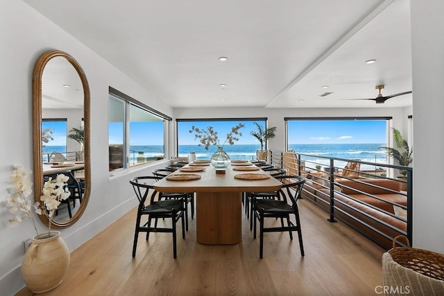 516 S The Strand # A, Oceanside, CA 92054 - dining room featuring a water view, healthy amount of natural light, light wood-style floors, and recessed lighting