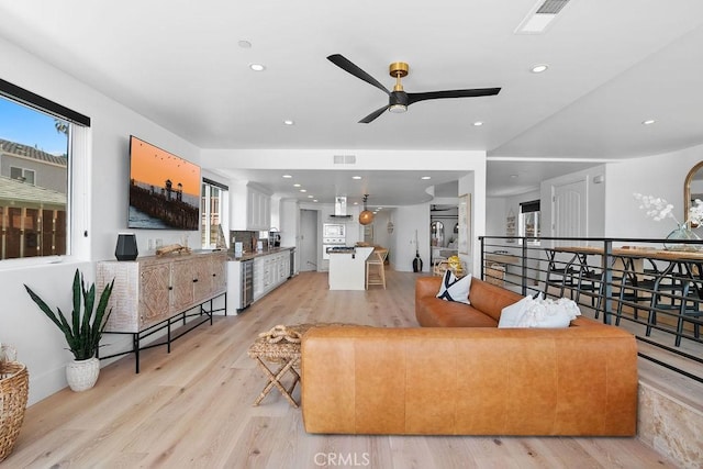 516 S The Strand # A, Oceanside, CA 92054 - living room featuring ceiling fan, light wood-style flooring, plenty of natural light, and recessed lighting