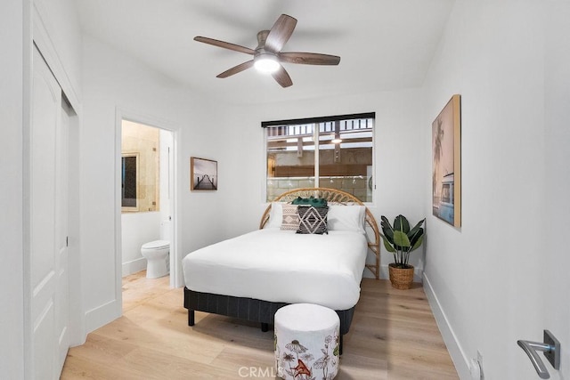 516 S The Strand # A, Oceanside, CA 92054 - bedroom with light wood-style floors, connected bathroom, ceiling fan, and a closet