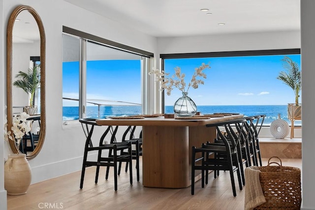 516 S The Strand # A, Oceanside, CA 92054 - dining space with wood finished floors and a water view