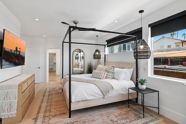 516 S The Strand # A, Oceanside, CA 92054 - bedroom featuring multiple windows, wood finished floors, and recessed lighting