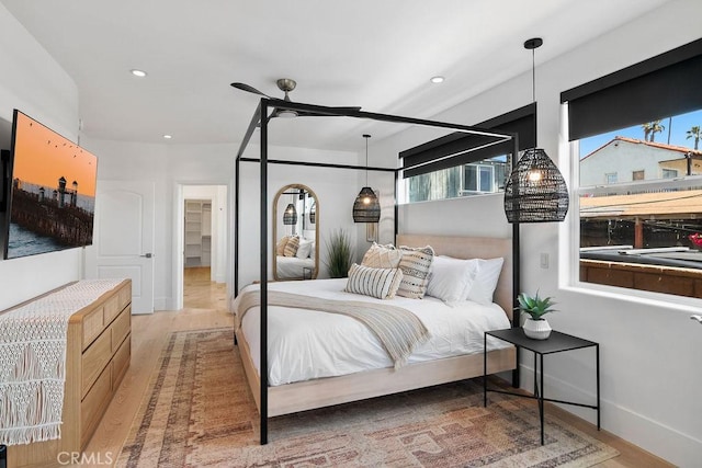 516 S The Strand # A, Oceanside, CA 92054 - bedroom with multiple windows, wood finished floors, and recessed lighting