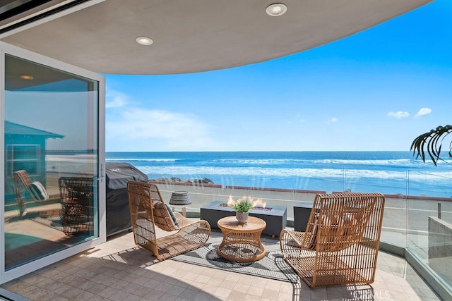 516 S The Strand # A, Oceanside, CA 92054 - balcony featuring an outdoor fire pit and a water view