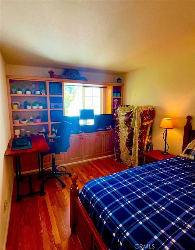 130 Cypress Ave, Cayucos, CA 93430 - bedroom featuring wood finished floors and a desk