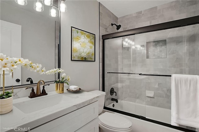 10555 Vassar Ave, Chatsworth, CA 91311 - bathroom with vanity and bath / shower combo with glass door
