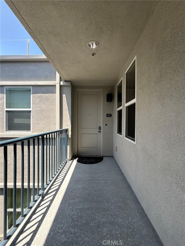 300 E 4th St Unit 422, Long Beach, CA 90802 - entrance to property with stucco siding and a balcony