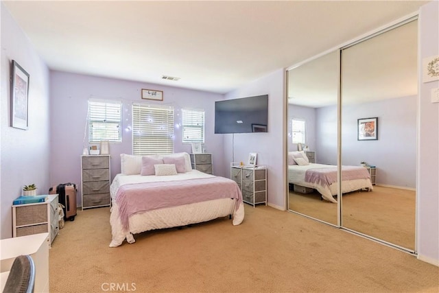 2168 Stonewood St, Mentone, CA 92359 - bedroom with carpet flooring and a closet