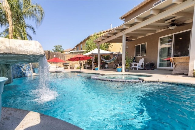 2168 Stonewood St, Mentone, CA 92359 - view of swimming pool with a ceiling fan, a patio, and a pool with connected hot tub