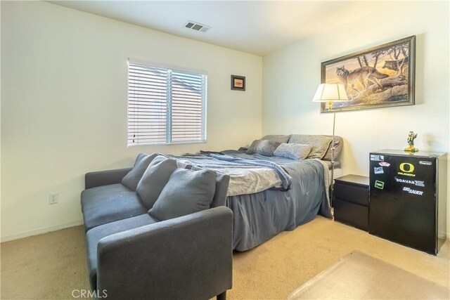 2168 Stonewood St, Mentone, CA 92359 - carpeted bedroom featuring baseboards