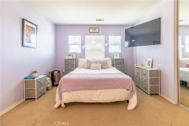 2168 Stonewood St, Mentone, CA 92359 - bedroom featuring light carpet and baseboards