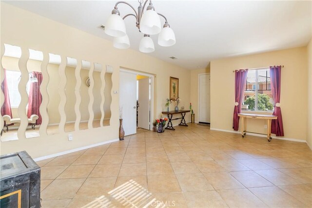 2168 Stonewood St, Mentone, CA 92359 - interior space featuring a chandelier and tile patterned floors