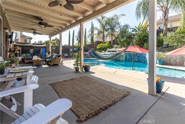 2168 Stonewood St, Mentone, CA 92359 - view of pool with a ceiling fan, a patio, a fenced backyard, and a pool with connected hot tub