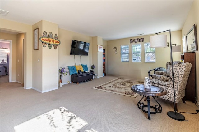 2168 Stonewood St, Mentone, CA 92359 - carpeted living area with baseboards