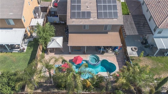 2168 Stonewood St, Mentone, CA 92359 - aerial view of property and surrounding area featuring a pool area