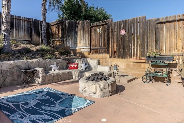 2168 Stonewood St, Mentone, CA 92359 - view of patio with an outdoor fire pit