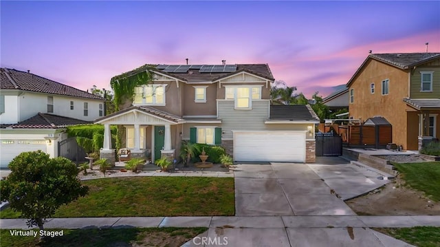 2168 Stonewood St, Mentone, CA 92359 - view of front facade featuring driveway, solar panels, stone siding, and a gate