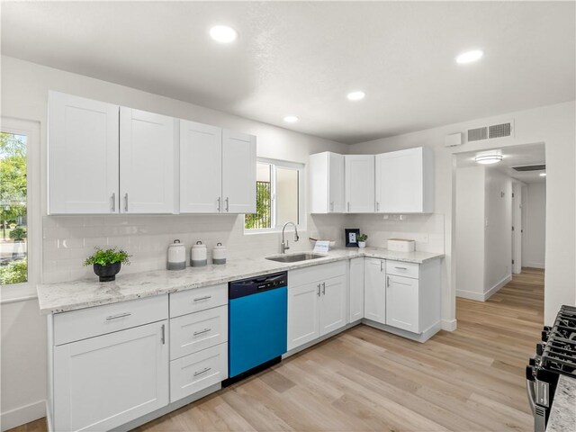 3236 W Browning Ave, Fresno, CA 93711 - kitchen featuring dishwasher, tasteful backsplash, white cabinets, gas stove, and light wood-type flooring