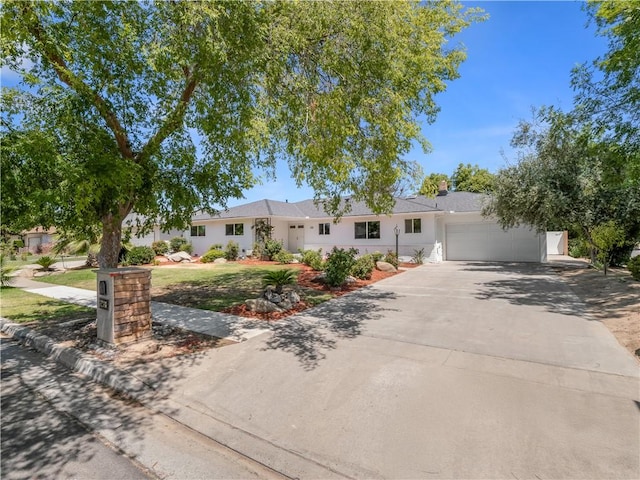 3236 W Browning Ave, Fresno, CA 93711 - single story home featuring driveway, an attached garage, and stucco siding