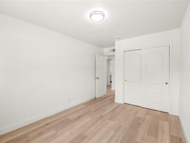 3236 W Browning Ave, Fresno, CA 93711 - unfurnished bedroom with light wood-type flooring and a closet