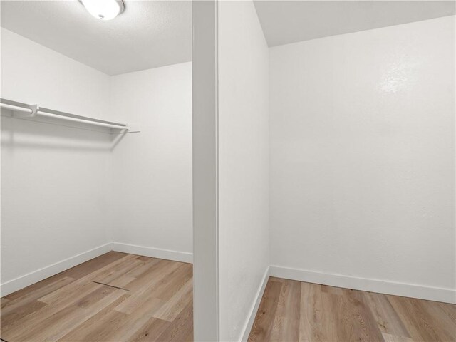 3236 W Browning Ave, Fresno, CA 93711 - walk in closet featuring wood finished floors