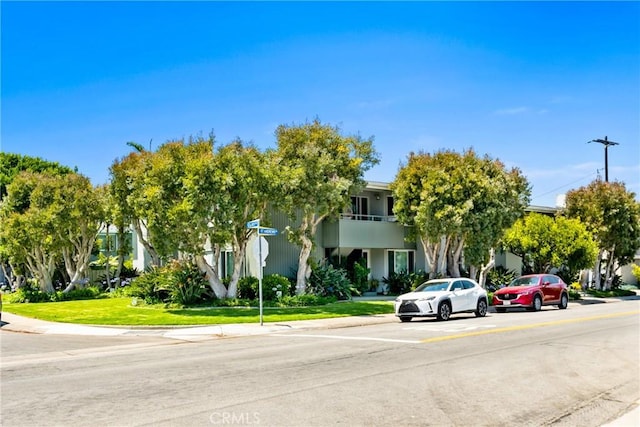 503 Saint Andrews Rd Unit E, Newport Beach, CA 92663 - view of front of house featuring a front lawn