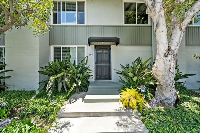 503 Saint Andrews Rd Unit E, Newport Beach, CA 92663 - property entrance featuring brick siding