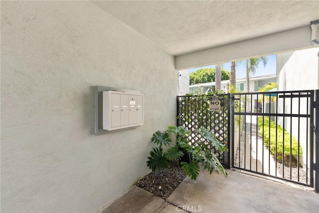 503 Saint Andrews Rd Unit E, Newport Beach, CA 92663 - view of patio with a gate