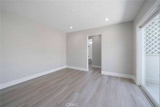 503 Saint Andrews Rd Unit E, Newport Beach, CA 92663 - unfurnished bedroom featuring light wood-style floors and recessed lighting