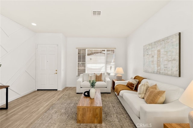 40065 Temple Ct, Murrieta, CA 92563 - living room featuring wood finished floors and recessed lighting