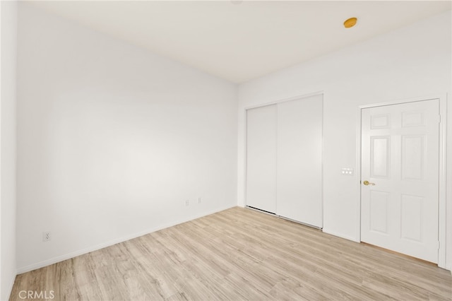 40065 Temple Ct, Murrieta, CA 92563 - unfurnished bedroom with light wood-type flooring and a closet