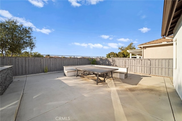 40065 Temple Ct, Murrieta, CA 92563 - fenced backyard with outdoor dining area and a patio area