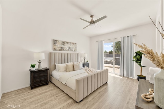 40065 Temple Ct, Murrieta, CA 92563 - bedroom featuring access to exterior, light wood-type flooring, and a ceiling fan