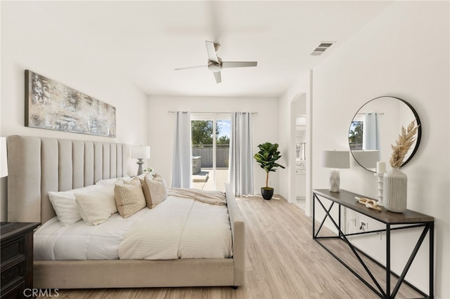 40065 Temple Ct, Murrieta, CA 92563 - bedroom featuring wood finished floors, ensuite bath, access to outside, and a ceiling fan