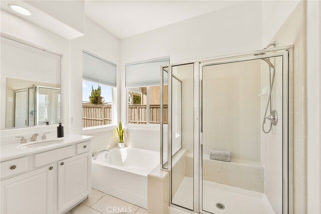 40065 Temple Ct, Murrieta, CA 92563 - bathroom with a shower stall, vanity, a bath, and tile patterned flooring