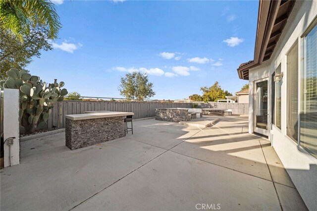 40065 Temple Ct, Murrieta, CA 92563 - fenced backyard featuring a patio