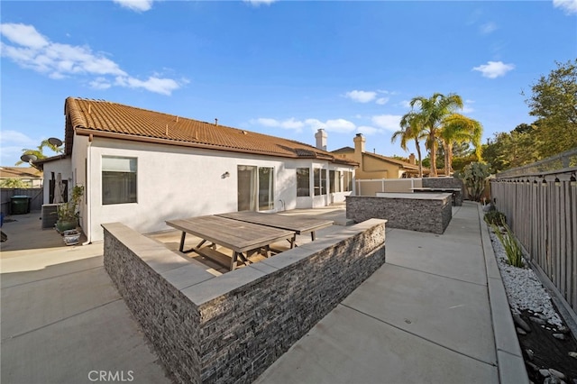 40065 Temple Ct, Murrieta, CA 92563 - rear view of property with a patio area, a fenced backyard, a tile roof, and stucco siding