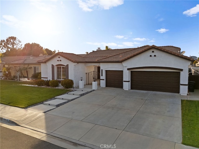 40065 Temple Ct, Murrieta, CA 92563 - mediterranean / spanish-style home with an attached garage, stucco siding, driveway, a front lawn, and a tile roof