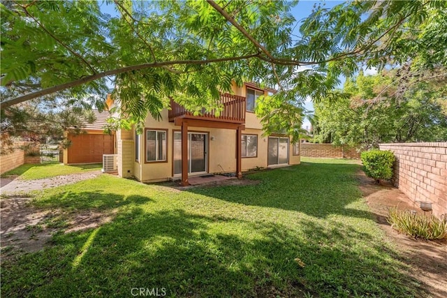 39513 Daylily Pl, Palmdale, CA 93551 - rear view of house with a balcony, a garage, and stucco siding